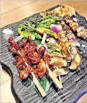  ?? CONTRIBUTE­D BY WYATT WILLIAMS PHOTOS ?? Hopstix offers nearly 20 options of robatayaki skewers, including pork belly, shiitake mushrooms, and shishito peppers.
