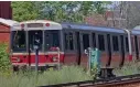  ?? MATT STONE / HERALD STAFF ?? TRACKING TROUBLE: A Red Line train heads south through Dorchester.