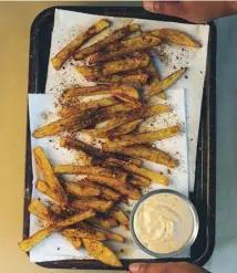  ??  ?? Baked cheesecake, main; masala chips with smoked paprika and garlic mayonnaise, above