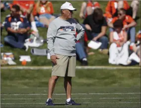  ?? DAVID ZALUBOWSKI - THE ASSOCIATED PRESS ?? Denver Broncos head coach Vic Fangio looks on during drills at the opening day of the team’s NFL football training camp Thursday, July 18, 2019, in Englewood, Colo.