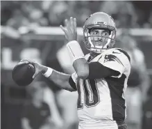  ?? ASSOCIATED PRESS FILE PHOTO ?? New England Patriots backup quarterbac­k Jimmy Garoppolo may be looking at a starting opportunit­y and a sizable raise with another team this NFL season.
