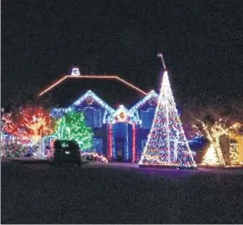  ??  ?? Part of the holiday light display of Bryan Karp, Anna Court, Cedar Park.
