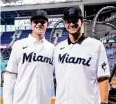  ?? MARK BROWN Getty Images ?? Cody Morissette, left, and Joe Mack were on hand Friday, but the punchless Marlins lost to San Diego.