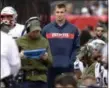  ?? MARK ZALESKI — THE ASSOCIATED PRESS ?? Patriots tight end Rob Gronkowski, center, watches from the sideline during the team’s 34-10 loss to the Titans in Nashville, Tenn., on Nov. 11.