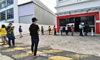  ??  ?? Poslaju customers in East Malaysia are urged to be patient while waiting for their parcel.