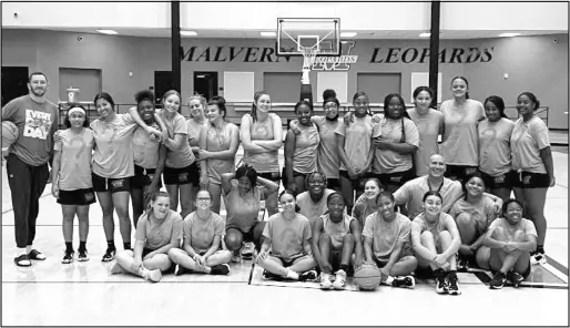  ?? ?? Malvern Lady Leopards senior and junior high hoopsters with camp directors JJ Davis, Head Women’s Basketball Coach at Neosho County Community College and Kenny Eddy, Head Men’s Basketball Coach at Pratt Community College participat­e in “Our Culture” basketball camp hosted at the Leopard Center, May 26-27.