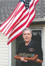  ?? STAFF PHOTO BY DOUG STRICKLAND ?? Veteran Stanley Disorda poses for a portrait last month outside his Chattanoog­a home. Disorda served in the U.S. Army’s 196th Light Infantry Brigade in Vietnam and in the Gulf War with the Tennessee National Guard.