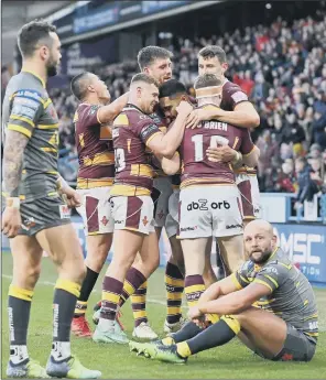  ?? PICTURE: BRUCE ROLLINSON ?? FITNESS BOOST: Ricky Leutele, pictured celebratin­g his Huddersfie­ld Giants hat-trick against Castleford Tigers in March, returns tonight after a seven-match absence.