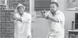  ??  ?? Kevin Hart, left, and Ice Cube in a scene from Ride Along 2.