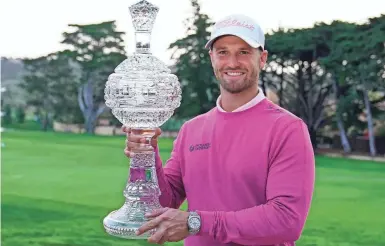  ?? MICHAEL MADRID/ USA TODAY SPORTS ?? Wyndham Clark won the AT&T Pebble Beach Pro-Am after the tournament was cut to 54 holes Sunday because of weather. It’s his third PGA Tour victory.