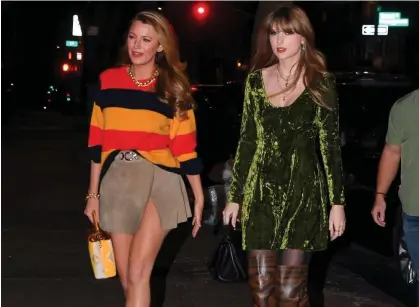  ?? Photograph: Robert Kamau/GC Images ?? Taylor Swift (right) in the green dress with Blake Lively in Brooklyn, New York.