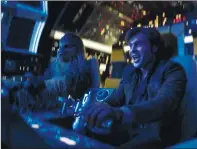  ?? JONATHAN OLLEY/LUCASFILM VIA AP ?? In this image released by Lucasfilm, Alden Ehrenreich, right, and Joonas Suotamo appear in a scene from "Solo: A Star Wars Story."