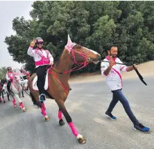 ?? AFP ?? The Pink Caravan Ride makes its way through Dubai in February last year. The campaign raises awareness about breast cancer and offers free consultati­ons and screenings