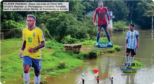  ?? ?? PLAYER PASSION: Giant cut-outs of (from left) Brazil’s Neymar Jr, Portuguese ristiano onaldo and Argentine Lionel essi at ozhikode n Kerala