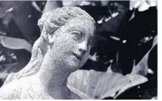  ?? CITY OF ORLANDO HISTORIC PRESERVATI­ON BOARD ?? Erica Gibbs-Sherman’s photo of a statue at Harry P. Leu Gardens appears in the Orlando Historic Preservati­on Board’s 2019 calendar, which features black-andwhite images.