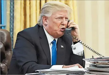  ?? ALEX BRANDON/AP ?? President Donald Trump speaks with Australian Prime Minister Malcolm Turnbull during a contentiou­s call Jan. 28.