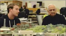  ??  ?? Zuckerberg with Gehry, who designed Facebook’s Menlo Park