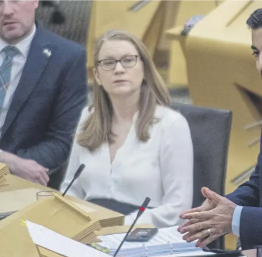  ?? ?? First Minister Humza Yousaf answers questions about XL Bully dogs at FMQS. His critics, including long-standing SNP MSP Christine Grahame, right, says he has been bullied into making this announceme­nt and she cannot support such a policy