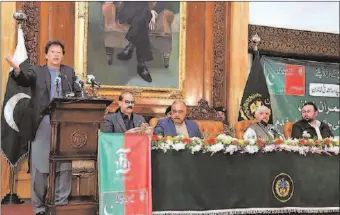  ?? -APP ?? Prime Minister Imran Khan addressing the health card distributi­on ceremony at Governor House.