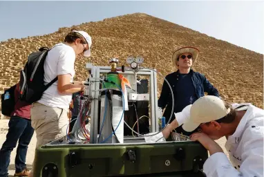  ?? PICTURES: THE NEW YORK TIMES ?? HI-TECH TOOLS: Researcher­s set up a muon telescope in front of the Great Pyramid of Giza’s north face. Borrowing a technique from particle physics, they found a ‘void’ within the pyramid’s stones.