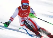  ?? THE ASSOCIATED PRESS ?? Austria’s Marcel Hirscher skis Tuesday during the slalom portion of the men’s combined at the 2018 Winter Olympics in Jeongseon, South Korea.