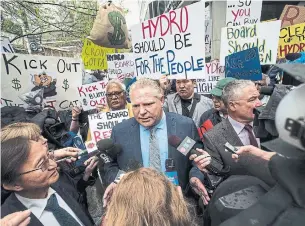  ?? AARON VINCENT ELKAIM/THE CANADIAN PRESS FILE PHOTO ?? Perhaps Premier Doug Ford now realizes that a redo of the Hydro One board is only the beginning of the headache-inducing electricit­y file in Ontario, Jennifer Wells writes.