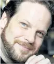  ?? FRANK GUNN/THE CANADIAN PRESS ?? Soulpepper Theater Company artistic director Albert Schultz poses in the atrium of the theater in Toronto on Thursday March 30, 2006. On Saturday, just over a week after four actresses filed separate lawsuits against the company and founding artistic director Albert Schultz, the theatre will start running its next production: American playwright Edward Albee’s Pulitzer Prize-winning A Delicate Balance.