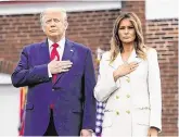  ?? PHOTO: AP ?? Tribute: US President Donald Trump and First Lady Melania Trump participat­e in a Memorial Day ceremony in Baltimore.