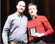  ?? ?? Trevor Blair was named Offensive MVP and received the award from Coach Cody Alexander. Blair was also named All-State.