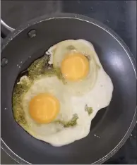 ??  ?? Fried eggs in pesto are a great way to elevate your breakfast.