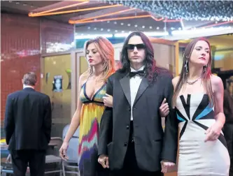  ?? JUSTINA MINTZ/A24 ?? James Franco plays the strange and mysterious director Tommy Wiseau in The Disaster Artist.