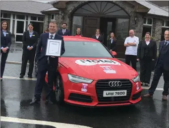  ??  ?? The team at the Dingle Skellig Hotel accepting their award.