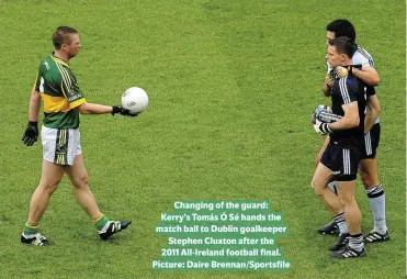  ??  ?? Changing of the guard: Kerry’s Tomás Ó Sé hands the match ball to Dublin goalkeeper Stephen Cluxton after the 2011 All-Ireland football final. Picture: Daire Brennan/Sportsfile