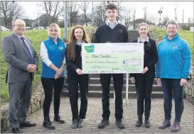  ?? (Photo Ita West) ?? Scoil Pól students raised €500 in a ‘dress down day’, and presented the cheque to representa­tives of Cliona’s Foundation. Pictured at the presentati­on are l-r: Mr. Mike O’Hara, Scoil Pól principal; Charlotte Kavanagh, Cliona’s Foundation; Celia Duggan, Paddy Lynch and Alesha South, with Terry Ring (Cliona’s Foundation).