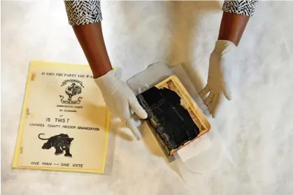  ?? Photograph: The Washington Post/Getty Images ?? A Buffalo Soldier’s bible from around 1913 and a 1966 pamphlet for the Black Panther party of Lowndes County, Alabama.