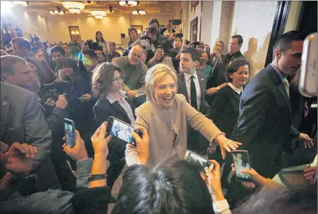  ?? Photograph­s by Barbara Davidson
Los Angeles Times ?? PRESIDENTI­AL HOPEFUL
Hillary Clinton at the Hilton hotel in San Gabriel, where she sought to connect with Asian Americans.