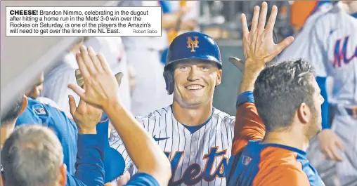  ?? Robert Sabo ?? CHEESE! Brandon Nimmo, celebratin­g in the dugout after hitting a home run in the Mets’ 3-0 win over the Rockies on Saturday, is one of the players the Amazin’s will need to get over the line in the NL East.