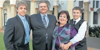  ?? PICTURES:RAYMOND PRESTON ?? BRAVERY: The Janse van Rensburg family, Jaco, father Dawie, mother Driekie and younger brother Dawie jnr, at the National Orders awards ceremony in Pretoria. The family accepted the award for bravery on behalf of their son and brother Michael who died...