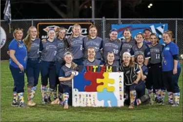  ?? DENNIS KRUMANOCKE­R - FOR DIGITAL FIRST MEDIA ?? The Kutztown softball team held its autism awareness night on April 13, the same night as the Cougars’ wild 18-17 victory over Exeter.