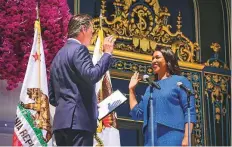  ?? AP ?? California Lt. Gov. Gavin Newsom swears in London Breed as San Francisco’s new mayor on Wednesday.