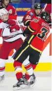  ?? THE CANADIAN PRESS ?? Troy Brouwer and the Flames are coming off a 4-2 loss to Carolina as they prepare to host Brouwer’s former team.