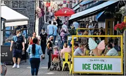  ??  ?? summer in the city: Diners enjoy the warm spell in Kilkenny