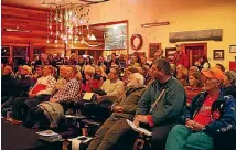  ?? CHERIE SIVIGNON/NELSON MAIL ?? Members of the crowd watch Nelson election candidates discuss transport issues at a forum.