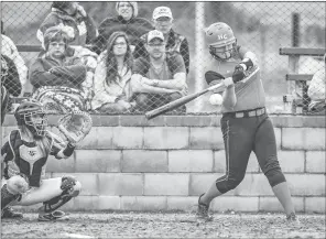  ?? GREG DAVIS/Special to The Saline Courier ?? Harmony Grove’s Kylie Burnett takes a cut at a pitch during a recent game. Burnett led Harmony Grove with three hits and an RBI in Friday’s 2-0 win over Perryville in the opening round of the Region 2 Regional Tournament at Paris.