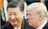  ?? – AP ?? In this Nov. 9, 2017 file photo, US President Donald Trump and Chinese President Xi Jinping at the Great Hall of the People in Beijing.