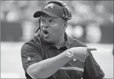  ?? GEORGE BRIDGES/AP PHOTO ?? Lions head coach Jim Caldwell gives directions to his players during a game against the Texans on Oct. 30, 2016 at Houston.