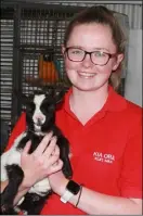  ??  ?? Kate Morris with Patricia the pygmy goat.