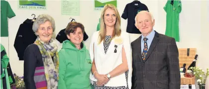  ??  ?? Royal Welsh Agricultur­al Society (RWAS) 2018 president Tom Tudor, with, from left, his wife Ann Tudor, chairwoman of feature county Montgomery­shire Anwen Orrells and lady ambassador Cathrin Roberts