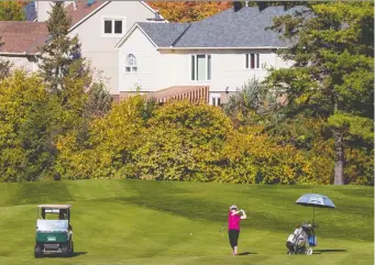  ?? ERROL MCGIHON ?? A golfer plays at Kanata Golf and Country Club. On Tuesday, ClubLink submitted to city hall its planning applicatio­n to turn 71 hectares of land at the golf course into a suburban infill neighbourh­ood.