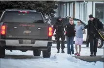  ?? Herald photo by Tijana Martin ?? A man was taken into custody following a four-hour standoff at a home on Dalhousie Court West.